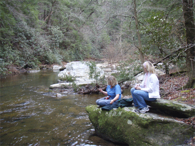 Mae and Donna lunching along the bank of Coker Creek