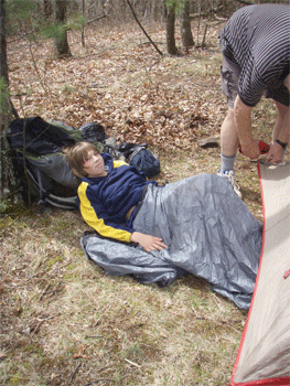 Matt Lundin lounging in camp