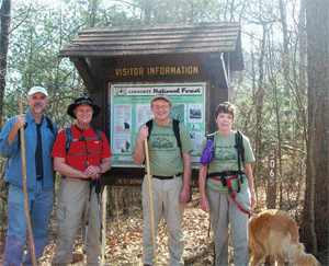 Us hikers at the trail kiosk